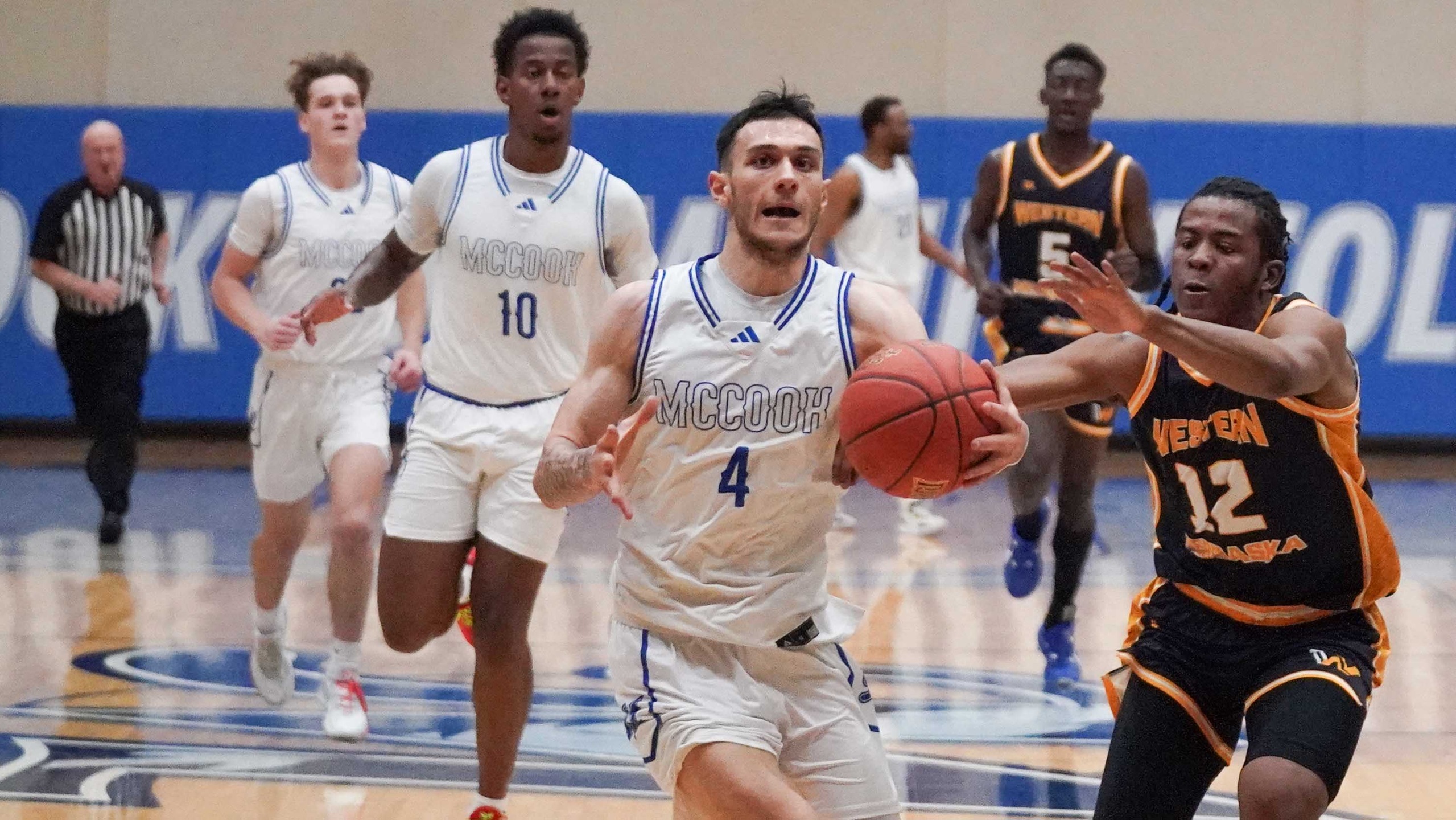 Cougars win eighth straight with 74-69 win over MCC men